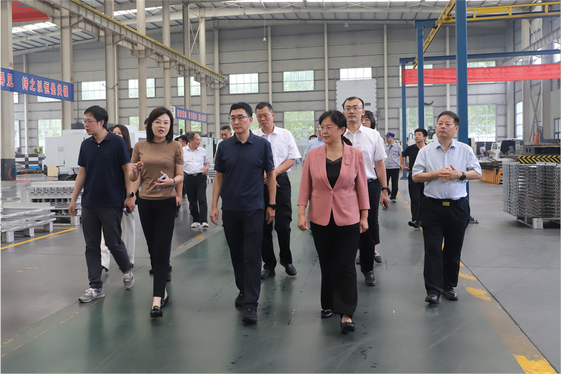 国家发改委体改司副司长蒋毅一行来山东hjc黄金城集团调研指导工作